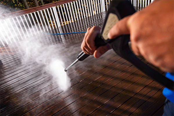 Power washing a deck